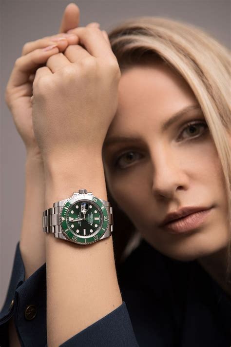 woman wearing rolex submariner